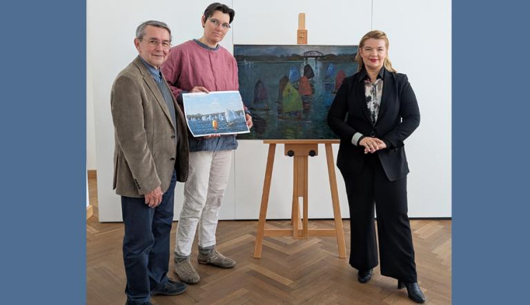 3 Personen (W. Vöse, E.M. Uecker, H. Warmt) - bei der Bildübergabe